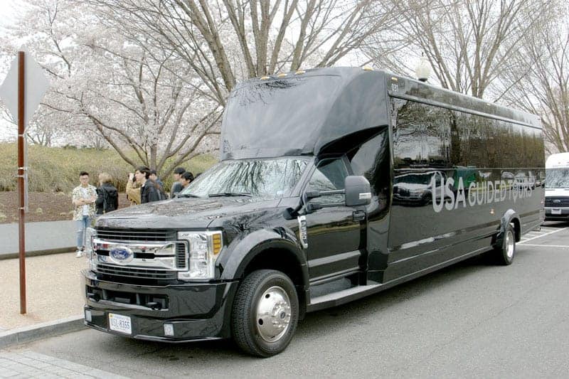 CLOSED-TOP LUXURY BUS